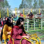 Students enjoying swings during 2nd Job Fair & Industrial Expo-2024 at Government College Women University