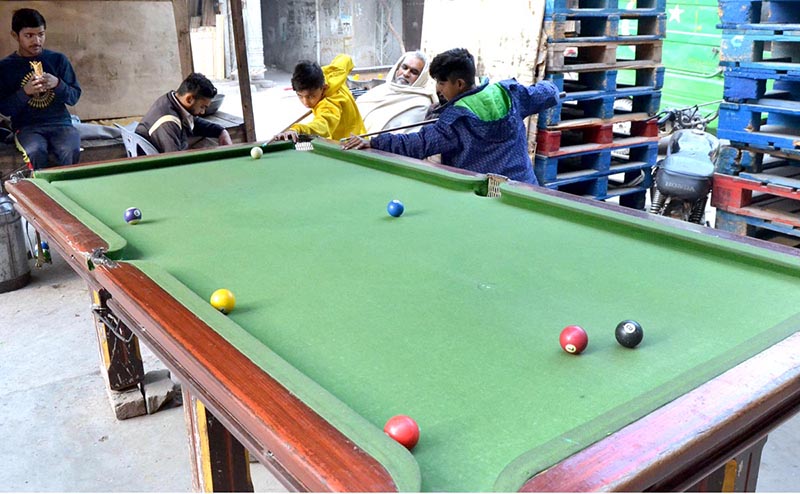 Children playing snooker at a local Snooker Club near Shadra