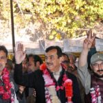 Pakistan People’s Party candidates from NA-148, Multan-I, Syed Yusuf Raza Gilani, NA-151, Multan-IV, Syed Ali Musa Gilani, and PP-213, Syed Ali Haider Gilani gesture to the supporters after winning their constituencies in the General Election according to unofficial results.