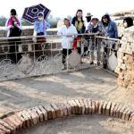 Delegation members of Japanese tourists visiting the world famous archeological site of Moen-Jo-Daro
