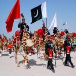 Rangers Cholistan Camel band presenting their skills at a ceremony held in connection with 19th TDCP Cholistan Desert Rally 2024 at Cholistan desert Jeep Rally
