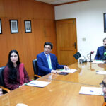 Director Urdu Science Board Lahore Ziaullah Khan giving a briefing to caretaker Federal Minister for National Heritage and Culture Jamal Shah