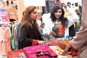 Women taking Selfie during winter Festival at Al Hamra Cultural Complex