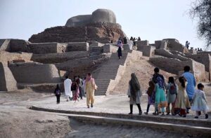 People visiting at the world famous archeological site of Moen-Jo-Daro.