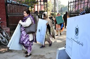 Polling staff receiving polling material at distribution Centre for General Elections 2024.