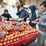 A vendor displaying and selling oranges to attract the customers at People Mansi area