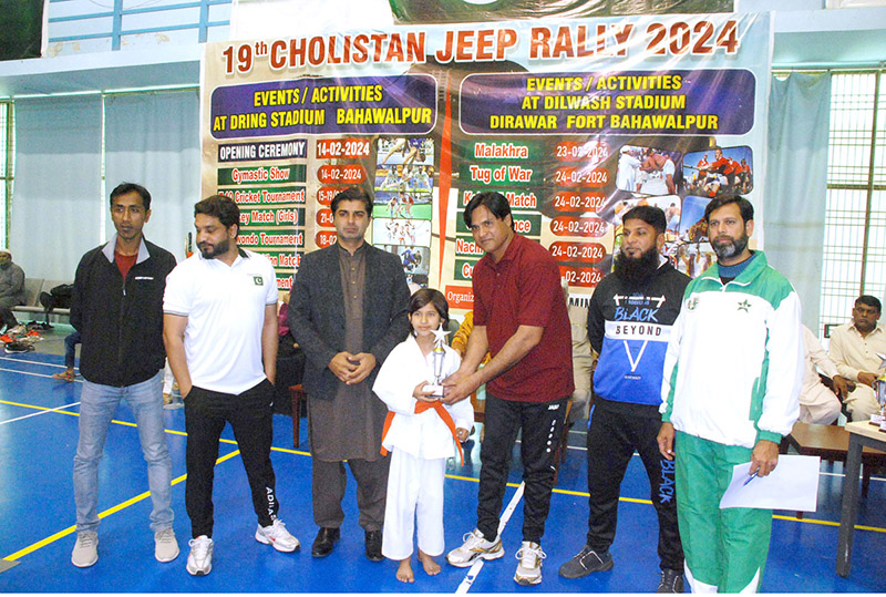 Taekwondo players performing at the 19th Cholistan Jeep Rally 2024 Sports Tournament at the stadium