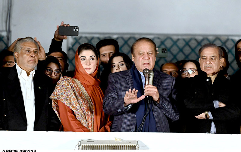 Pakistan's former Prime Minister and leader of the Pakistan Muslim League (PML-N) , Nawaz Sharif along with his brother, Shehbaz Sharif and his daughter Maryam Nawaz, speaks with supporters at Model Town