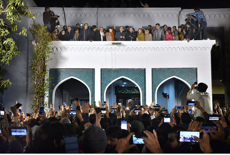 Pakistan's former Prime Minister and leader of the Pakistan Muslim League (PML-N) , Nawaz Sharif along with his brother, Shehbaz Sharif and his daughter Maryam Nawaz, speaks with supporters at Model Town