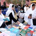 Women advocates viewing the different Books at stall during 3rd Law Books Festival 2024 at District Court, organized by District Bar Association.
