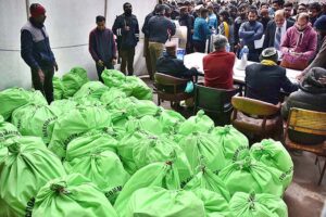 Polling staff receiving polling material at distribution Centre for General Elections 2024.