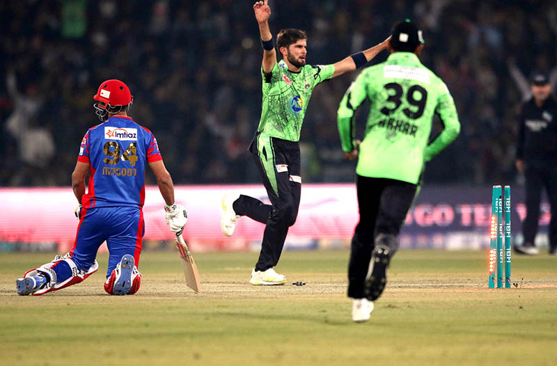 Spectators enjoying during the Pakistan Super League (PSL) Twenty20 cricket match between Lahore Qalanders and Karachi Kings at the Gaddafi Cricket Stadium