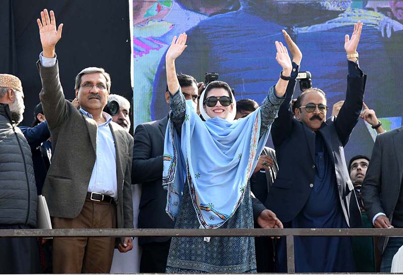 PPP Leader Aseefa Bhutto Zardari wave to public gathering during Election Campaign.