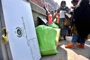 Polling staff receiving polling material at distribution Centre for General Elections 2024.