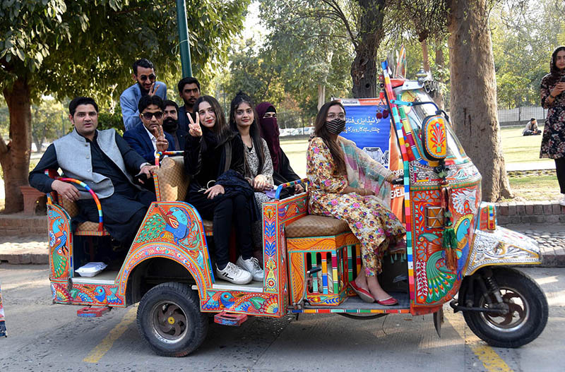 Women viewing artwork during the Lahore Literary Festival at Al-Hamra