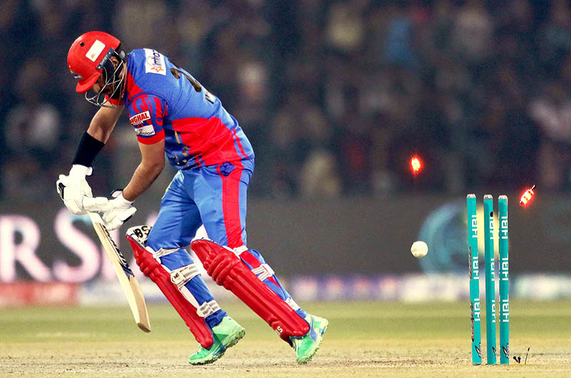 Spectators enjoying during the Pakistan Super League (PSL) Twenty20 cricket match between Lahore Qalanders and Karachi Kings at the Gaddafi Cricket Stadium