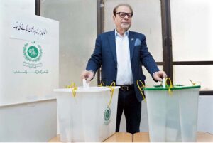 Caretaker Provincial Minister for Information, Minority Affairs, Social Protection and President of Arts Council of Pakistan Karachi Muhammad Ahmed Shah casts his vote at polling station, Clifton during General Election-2024