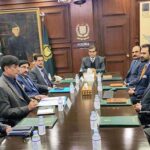 Federal Minister for Interior Dr. Gohar Ejaz chairing a briefing at NADRA headquarters.