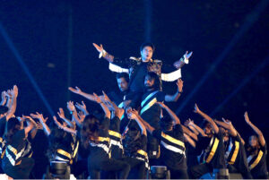 Star singers Ali Zafar and Aima Baig along with others performing on the stage at the opening ceremony of Pakistan Super League (PSL) Twenty 20 Cricket matches at Gaddafi Stadium
