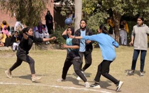 Players in action during inter-collegiate Girls Handball tournament organized by Sargodha Education board at Govt Women College Farooq Colony.