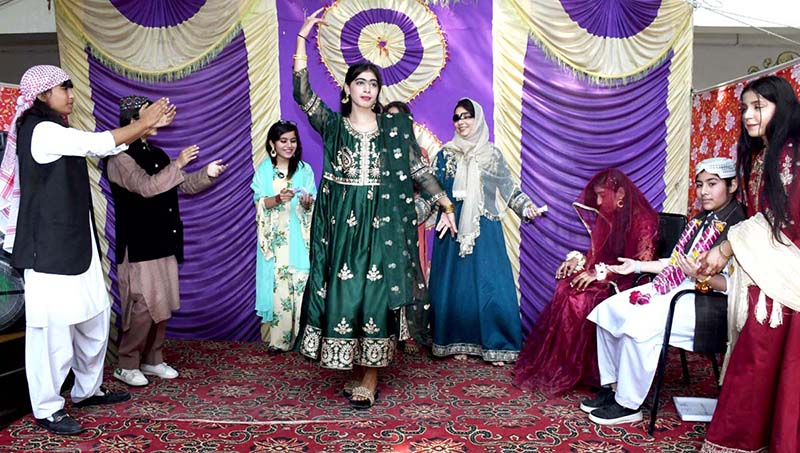 Students are performing during a function at Govt Little folks Girls High School Jinnah Bagh
