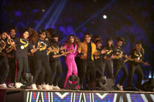 Star singers Ali Zafar and Aima Baig along with others performing on the stage at the opening ceremony of Pakistan Super League (PSL) Twenty 20 Cricket matches at Gaddafi Stadium
