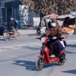 A woman riding Scotty on the way towards her destination