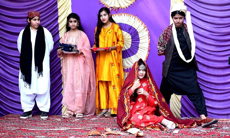 Students are performing during a function at Govt Little folks Girls High School Jinnah Bagh