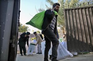 Polling staff on the way after receiving polling material at distribution Centre for General Elections 2024.