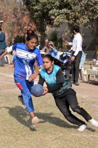 Players in action during inter-collegiate Girls Handball tournament organized by Sargodha Education board at Govt Women College Farooq Colony.