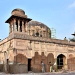 Labourers busy in renovation work of the historical Tomb of Dai Anga.Tomb of Dai Anga also known as the Gulabi Bag is a 17th-century Mughal Tomb Complex located in the Mughal-Era Suburb of Begampura, outside the Walled City of Lahore. The tomb of Dai Anga features a gateway that predates the tomb's construction. Built in 1655 C.E. by the Persian nobleman Mirza Sultan Baig, the gateway was originally the entrance to a pleasure garden