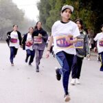 Students participating in a Marathon Race organized by Gymkhana in collaboration with Pakistan Army at Thandi Sarak.