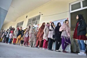 A large number of women standing in queue to cast their vote in the polling station during General Election-2024