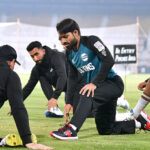 Players of Multan Sultans busy in warmup before the practice session for the upcoming PSL 9 at Multan Cricket Stadium.