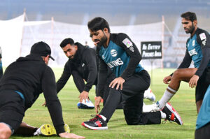 Players of Multan Sultans busy in warmup before the practice session for the upcoming PSL 9 at Multan Cricket Stadium.