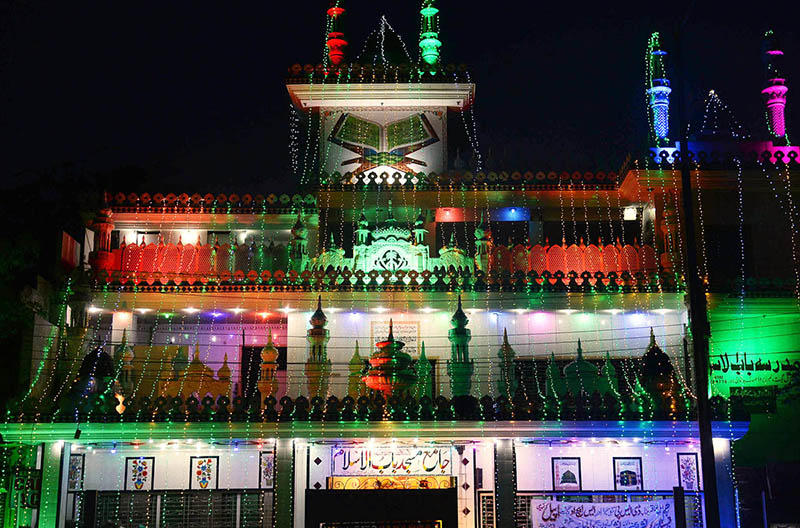 An illuminated view of mosque decorated with colourful lights in connection with Shab-e-Barat in the Provincial Capital