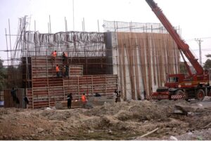 Labourers busy in construction work of flyover bridge in the Provincial Capital