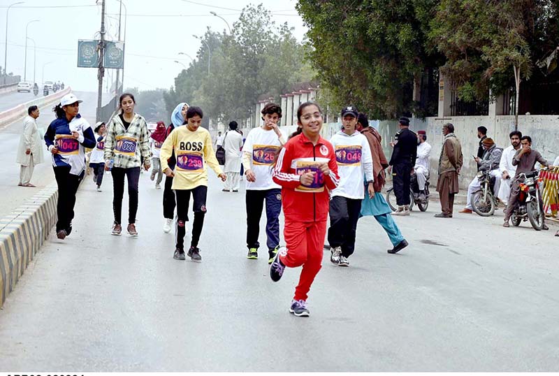 Students participating in a Marathon Race organized by Gymkhana in collaboration with Pakistan Army at Thandi Sarak.