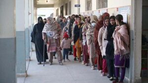 A large number of women standing in queue to cast their vote in the polling station during General Election-2024