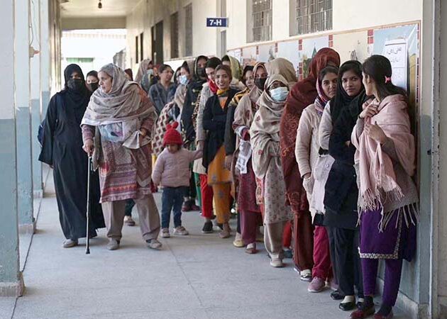 A large number of women standing in queue to cast their vote in the polling station during General Election-2024