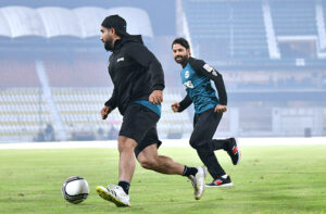 Players of Multan Sultans busy in warmup before the practice session for the upcoming PSL 9 at Multan Cricket Stadium.