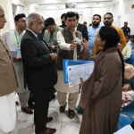 Senior Adviser to Federal Ombudsman Regional Office Karachi Syed Anwar Hyder having interaction with a woman during visit of Main Passport Office Saddar. Associate adviser Federal Ombudsman Karachi Riaz Ahmed Memon and Director Immigration and Passport South Zone Saeed Ahmed also seen at the occasion