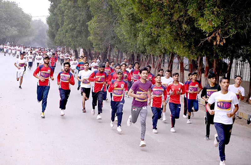 Students participating in a Marathon Race organized by Gymkhana in collaboration with Pakistan Army at Thandi Sarak.