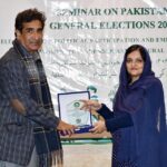 Honorable Mr. Tariq Mehmood Khan, Executive Director General/ PIO, receiving shield from Ms. Bushra Bashir, Director PID Lahore at Seminar on "Political Participation and Empowerment of Youth, Women, Transgender and Cultural Minorities