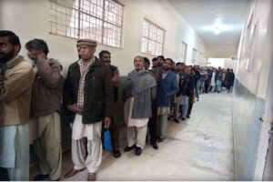 A large number of women standing in queue to cast their vote in the polling station during General Election-2024
