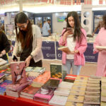 Women taking keen interest in books at a stall at 15th Karachi Literature Festival (KLF)