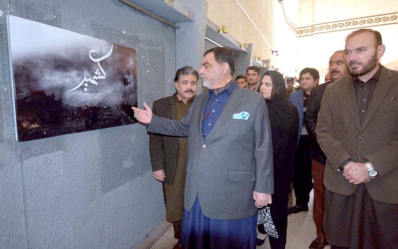 Minister Information and Tourism Barrister Feroze Jamal Kaka Khel visiting picture exhibition in connection with Kashmir Solidarity Day at Nishtar Hall