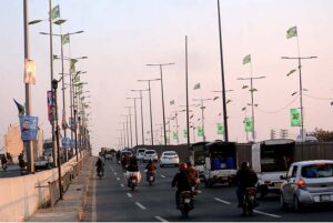 A convoy of army personnel patrols along a road in the city to develop a sense of protection among the masses and maintain law and order situation during the General Election 2024