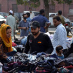 People busy purchasing used clothes at Landa Bazaar