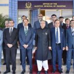 President Dr Arif Alvi in a group photo during his visit to the office of the Auditor General of Pakistan